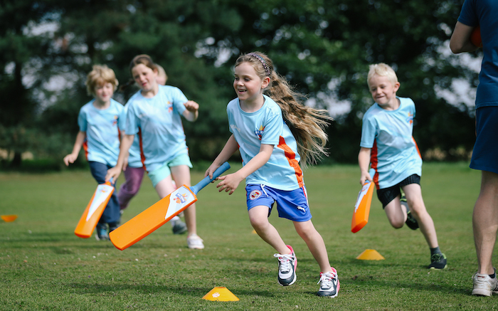 All Stars Cricket girl running