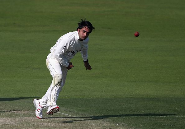 Rashid in red ball action