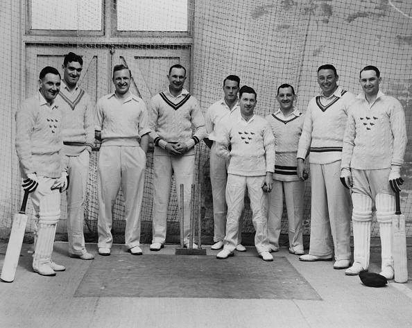 Members of the Sussex County Cricket Club during their first official practice at the nets in their club at Hove, UK, 25th March 1935. From left to right, Albert Wensley, Jim Hammond, Harry Parks, John Langridge, Bill Greenwood, Tich Cornford, James Cornford, Maurice Tate and James Langridge.