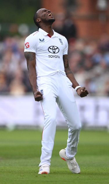 Jofra Archer celebrates the wicket of Ravindra Jadeja during day two of the Fourth Test Match between England and India at Emirates Old Trafford