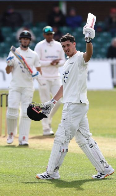 Tom Clark raises the bat
