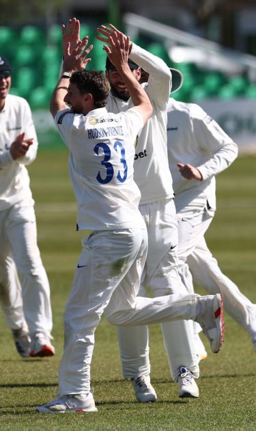 Fynn Hudson-Prentice celebrates a wicket.