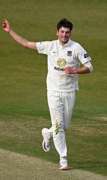 Henry Crocombe celebrates a wicket.