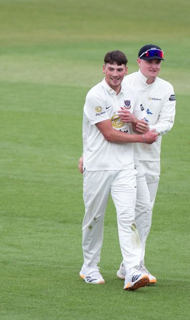 Henry Crocombe celebrating with Jack Carson