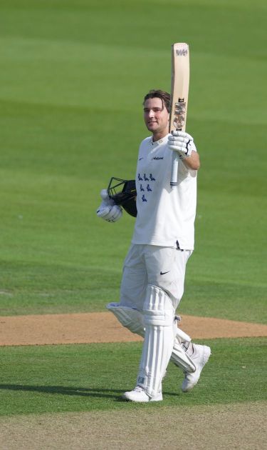 James Coles raises the bat