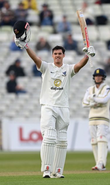 Tom Clark raises the bat