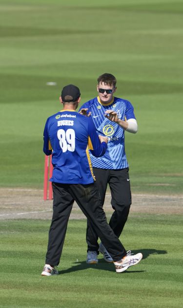 Jack Carson takes a wicket