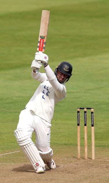 Tom Haines batting.