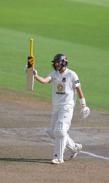 Charlie Tear raises the bat