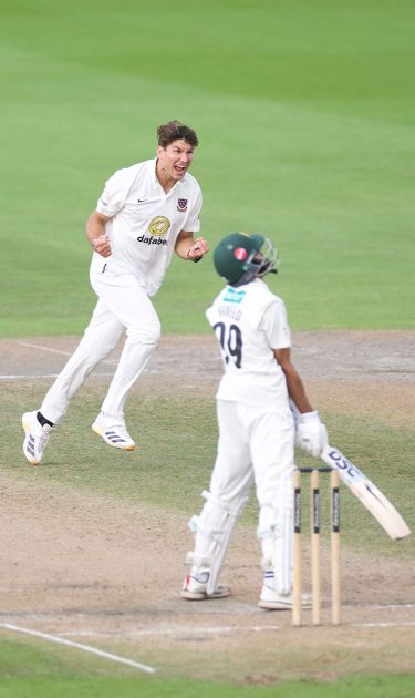 Ari Karvelas celebrates a wicket
