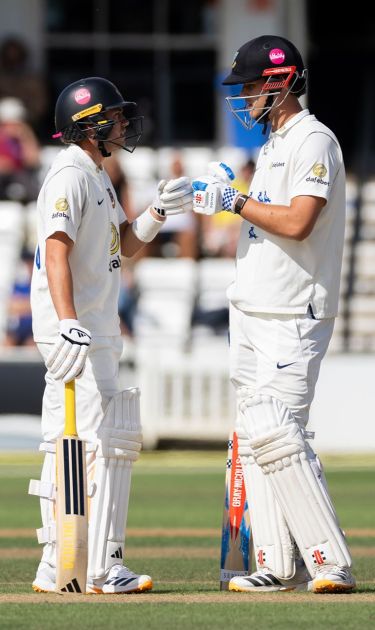 Charlie Tear and Tom Clark batting together.