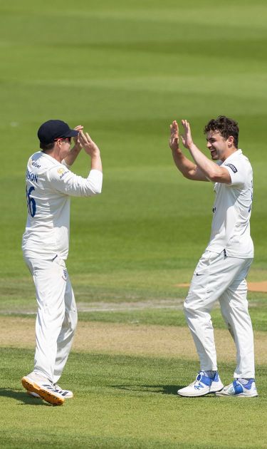 Tom Price celebrates with Jack Carson