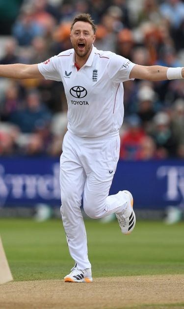 Ollie Robinson celebrates a wicket for England.