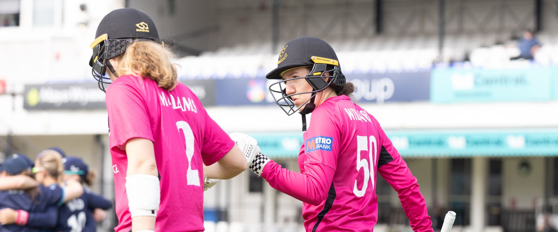 Mollie Adams and Phoebe Wilkinson step out to bat