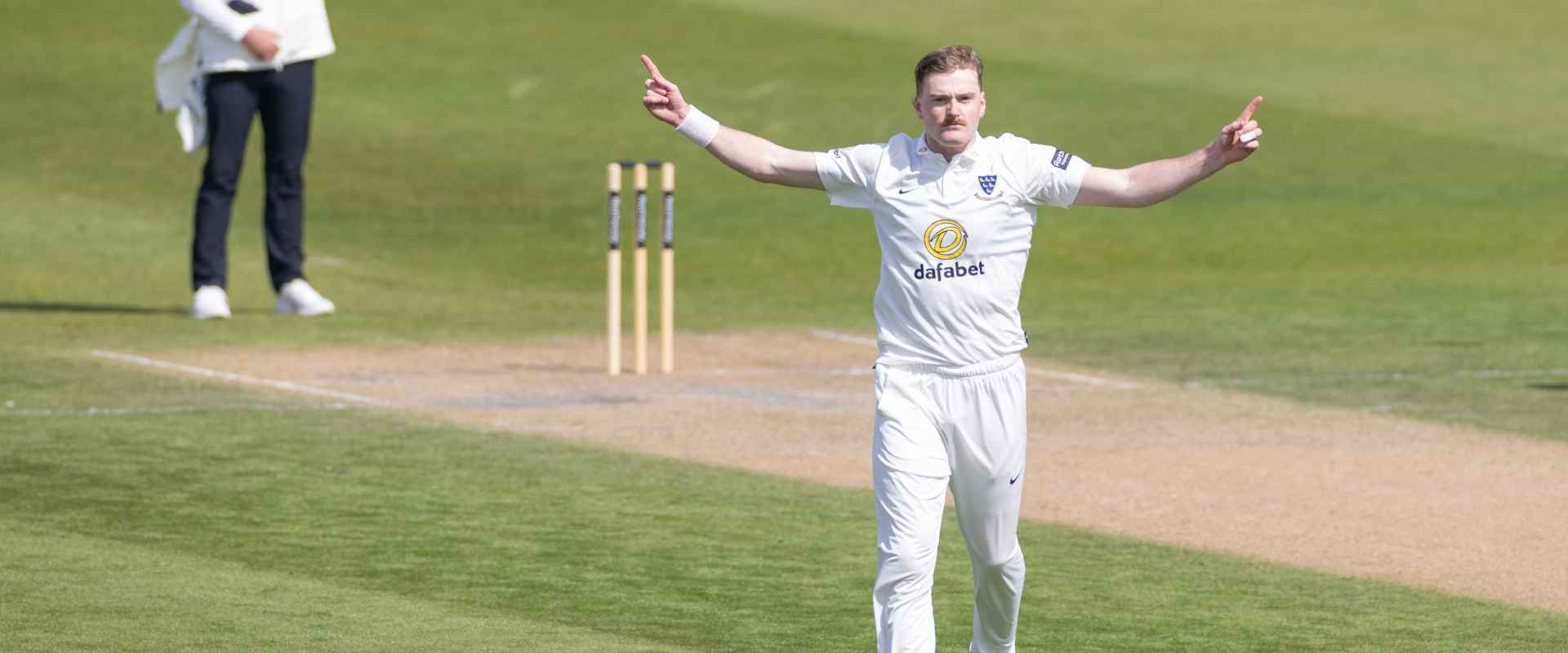 Sean Hunt celebrates a wicket against Somerset