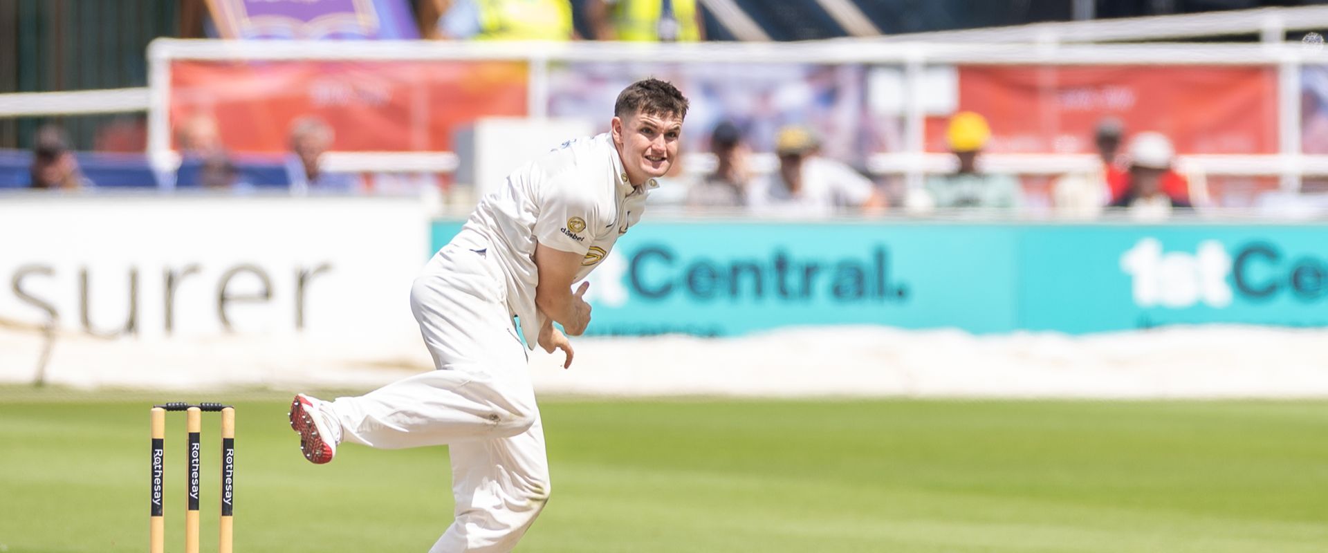 Jack Carson bowls a ball for Sussex.