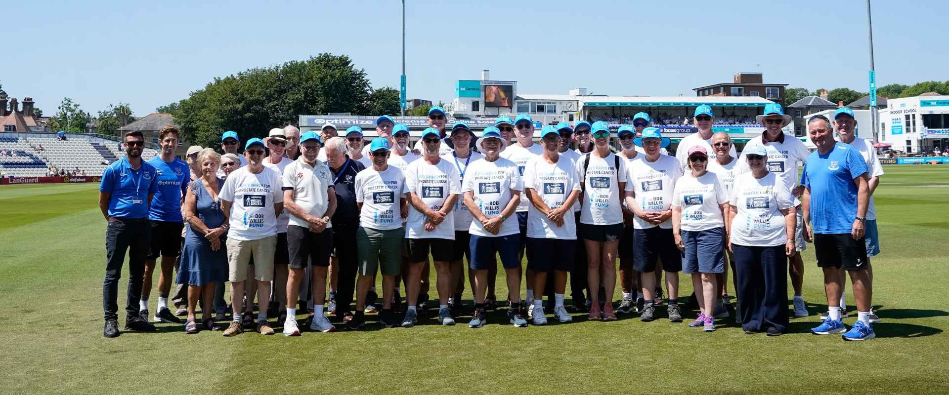 walkers of rons walk on the pitch at hove