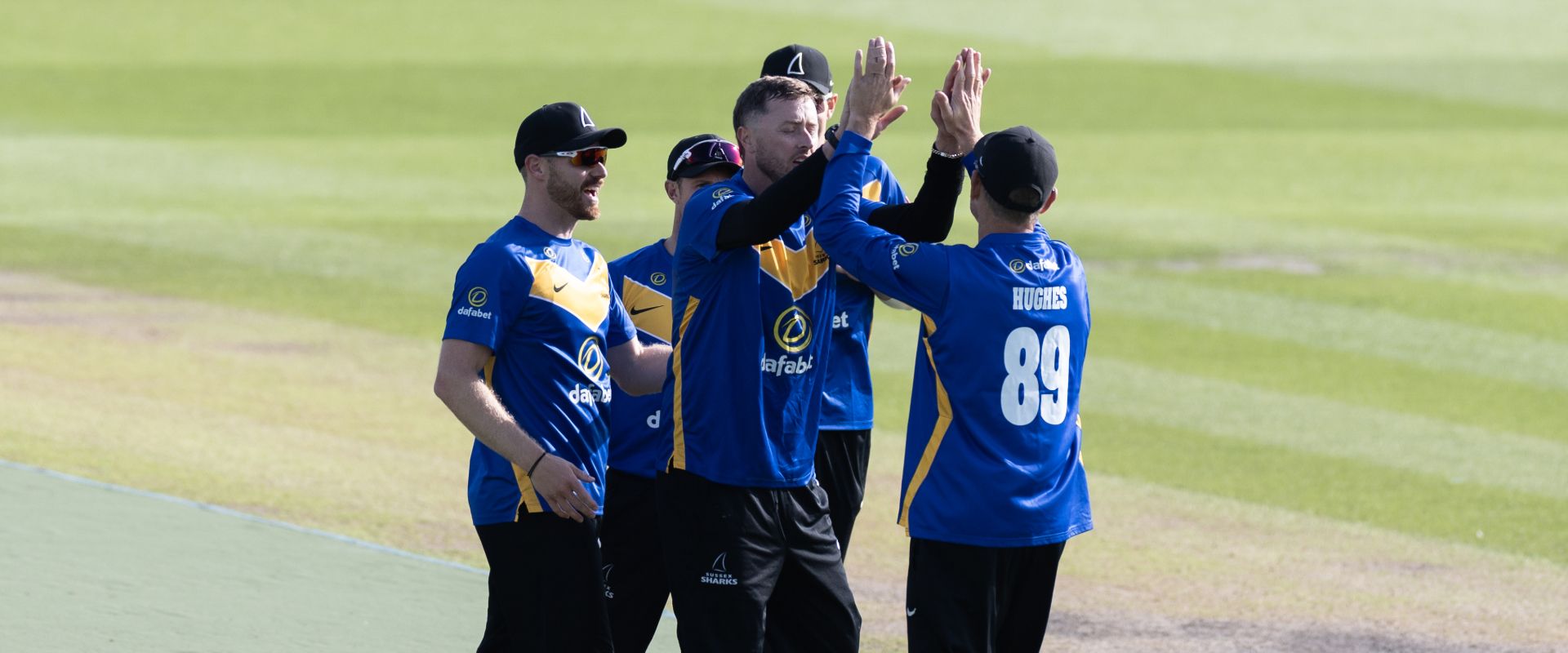 Sussex players celebrate after Ollie Robinson takes a wicket