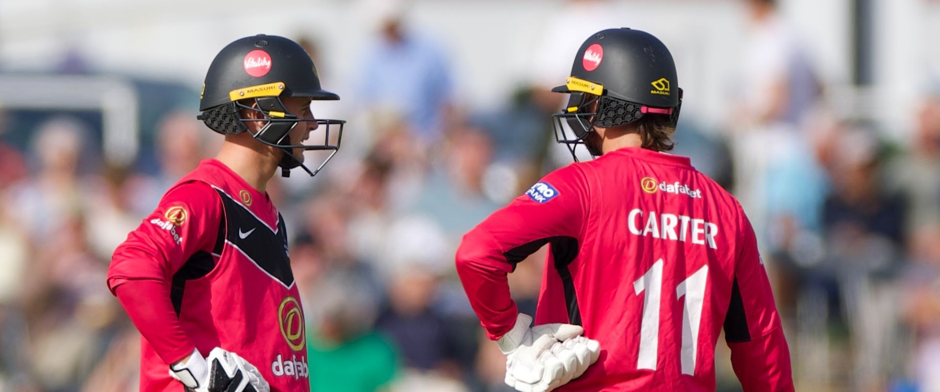 Lenham and Carter pictured in the middle together for Sussex.