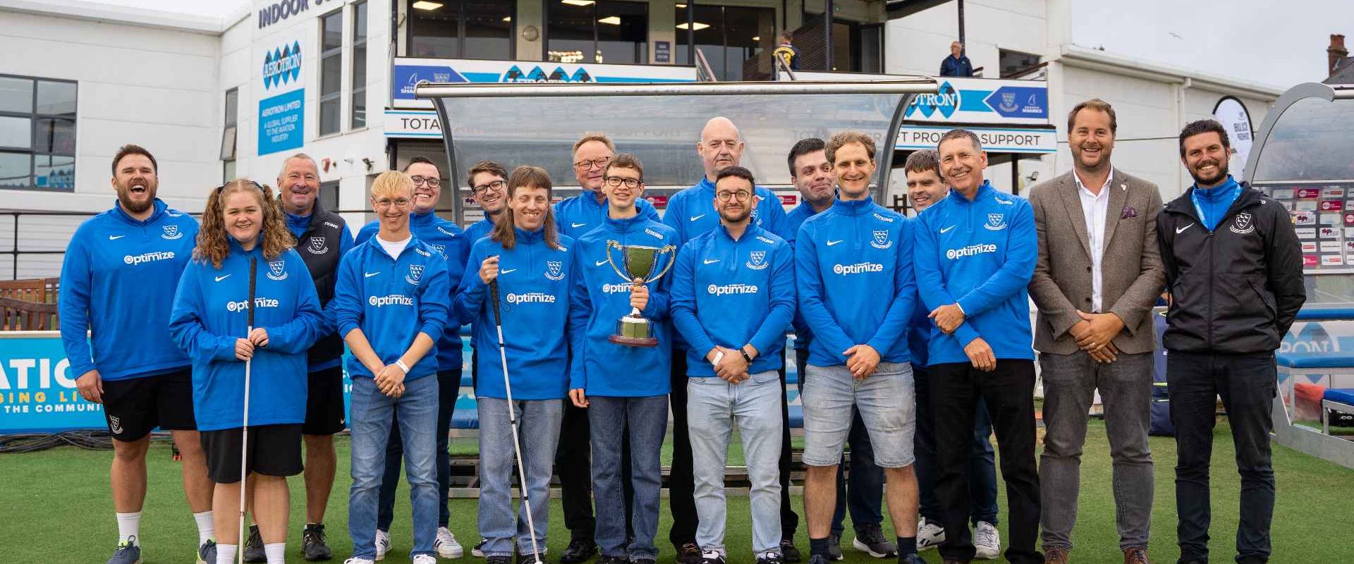 The Sussex Sharks VI squad pose in a team photo with paul farbrace at the 1st central county ground