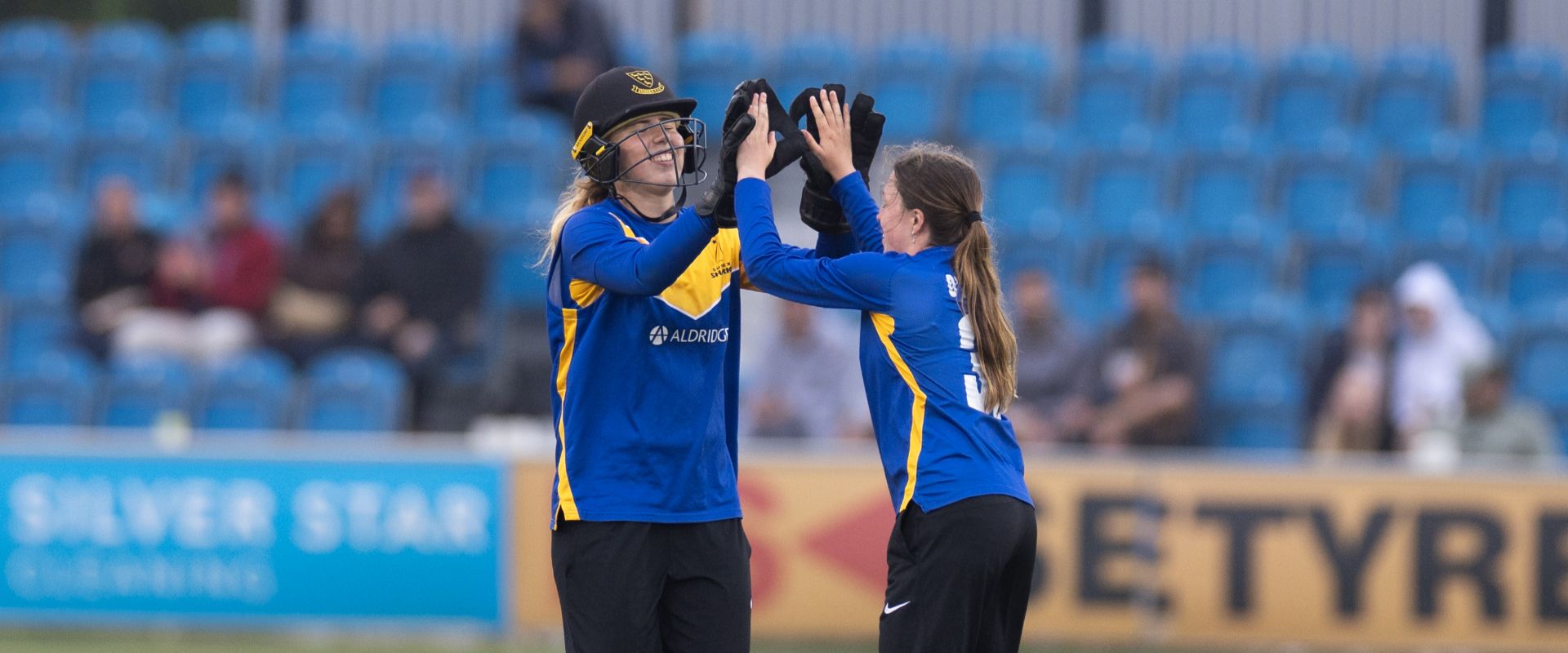 Mollie Adams celebrates with Eve O'Neill