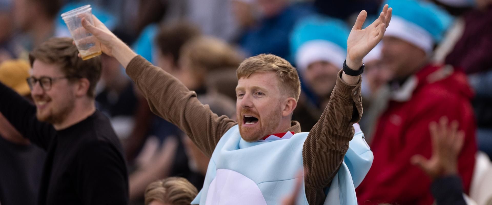 Sharks fan celebrates a wicket at hove