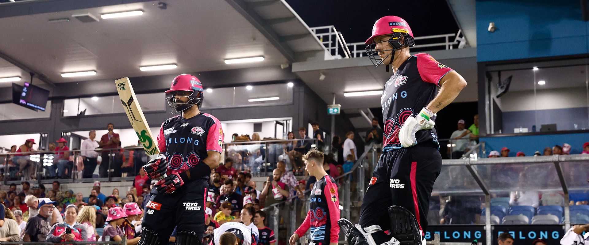 Daniel Hughes and Babar Azam await heading out to the crease