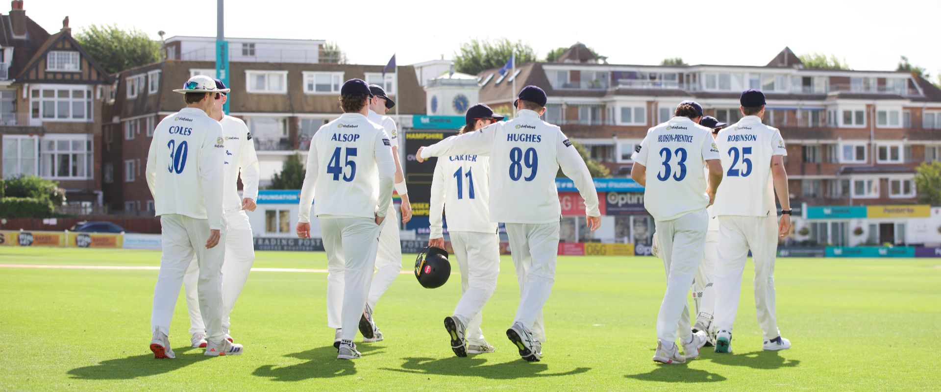 Sussex players walking onto the pitch at Hove
