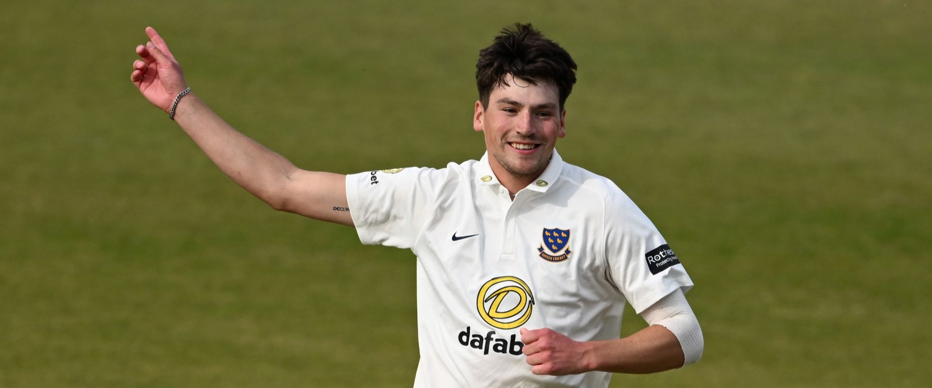 Henry Crocombe celebrates a wicket.