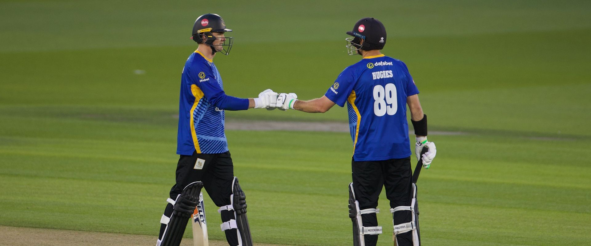 Carson and Hughes fistbump
