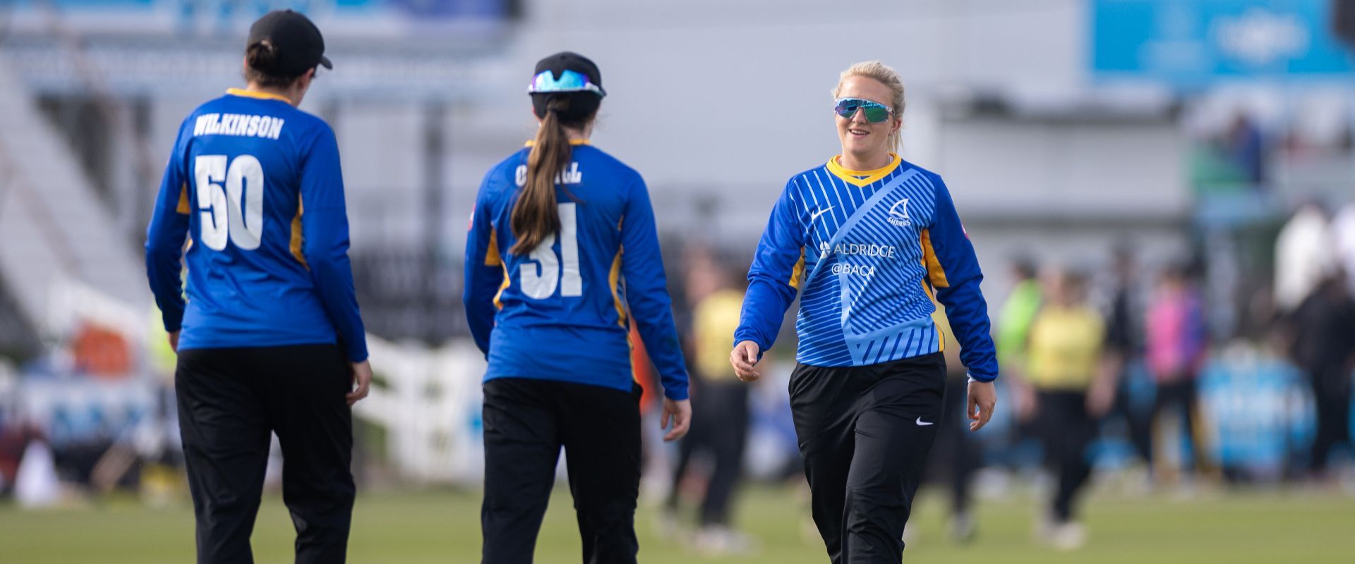 Chiara Green celebrates with her Sussex teammates