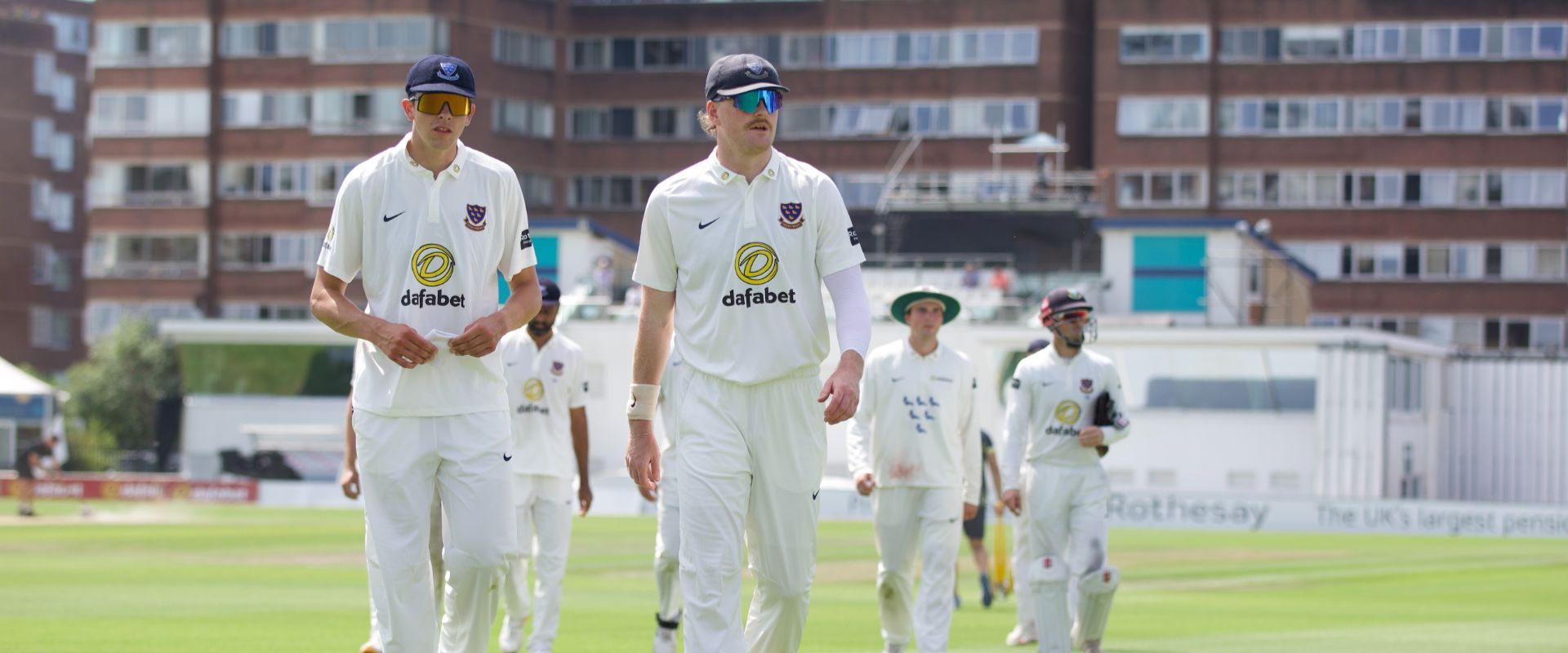 Sussex players walking off the pitch