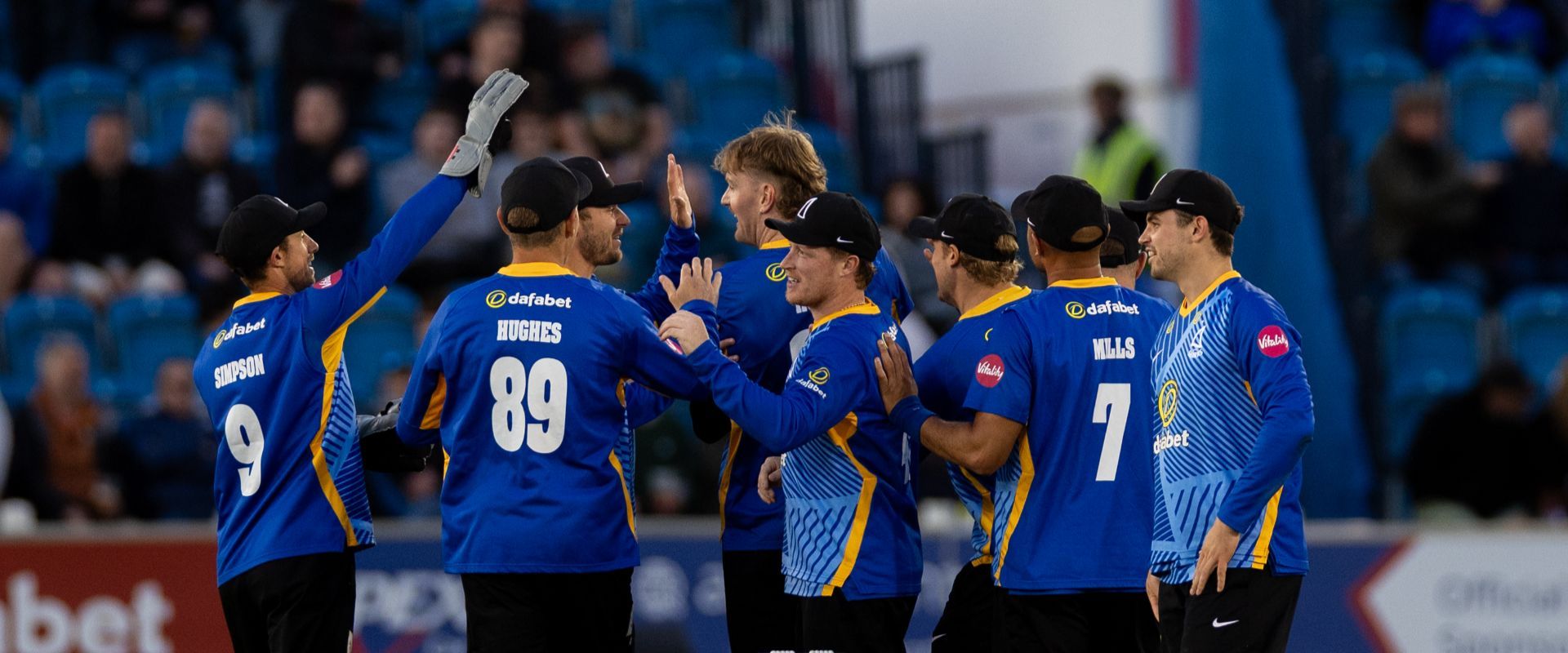 Sharks players celebrate a wicket