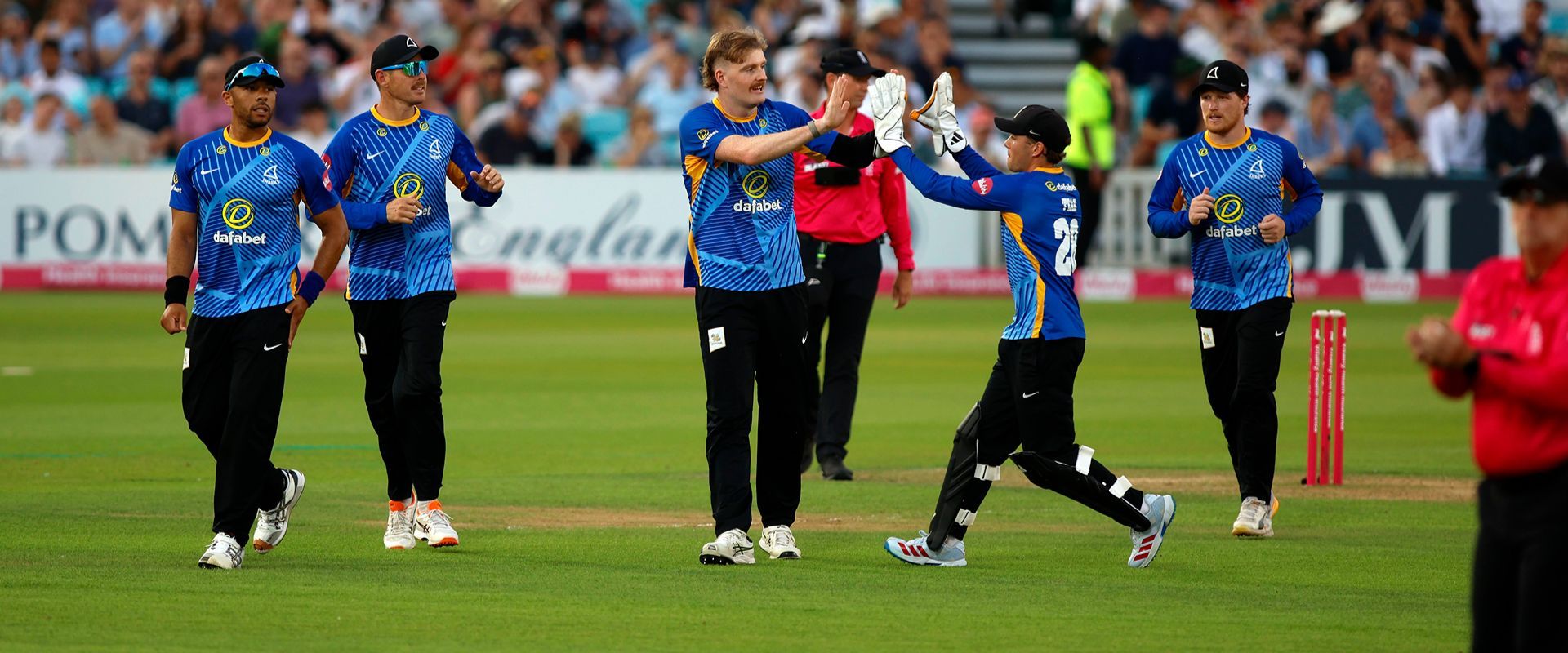 Surrey players celebrate