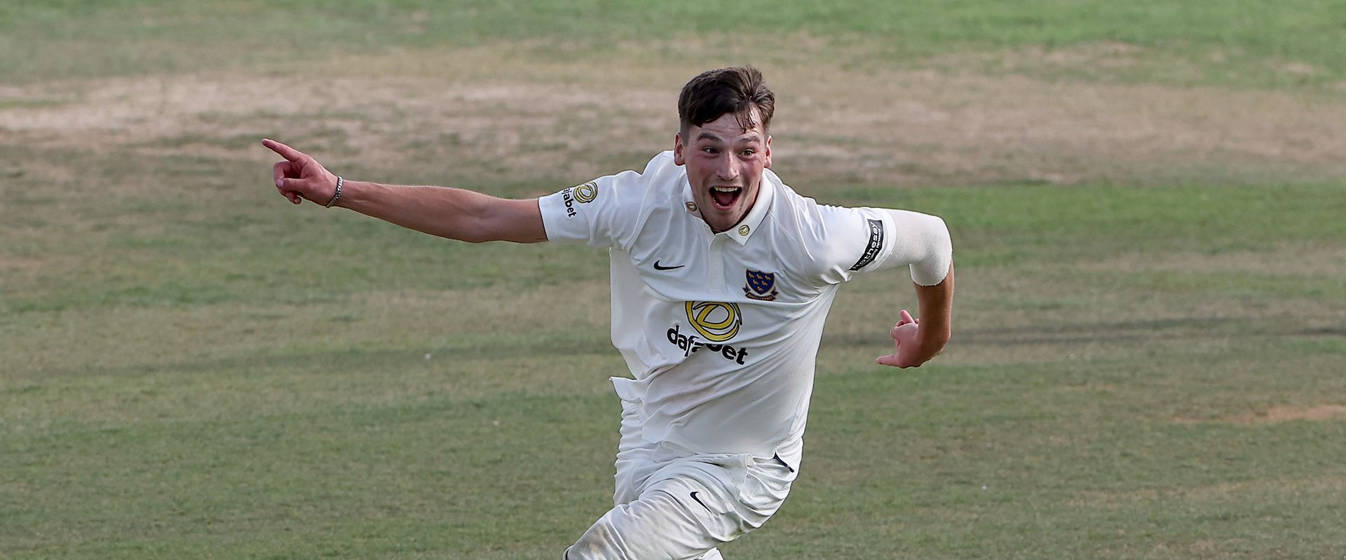 Henry Crocombe celebrates his hat-trick at Chelmsford.