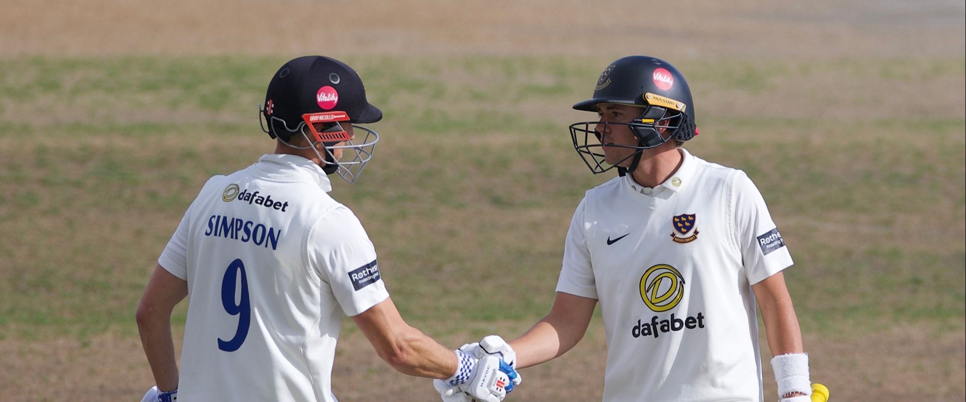 Simpson congratulates Tear on a fine knock