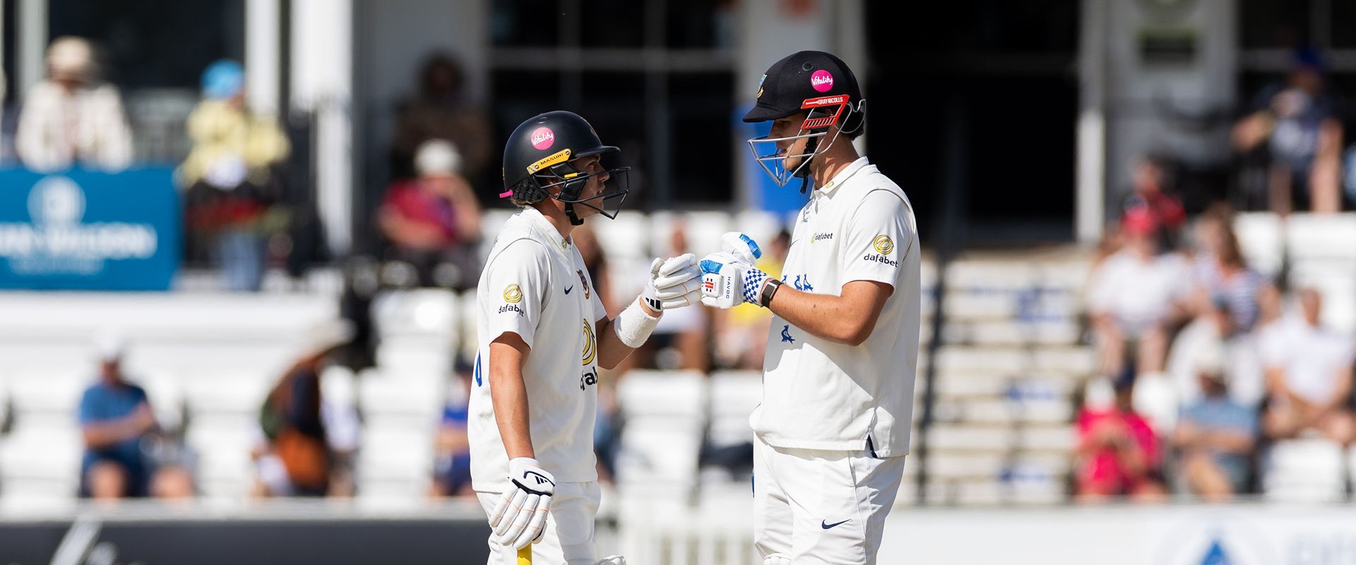 Charlie Tear and Tom Clark batting together.