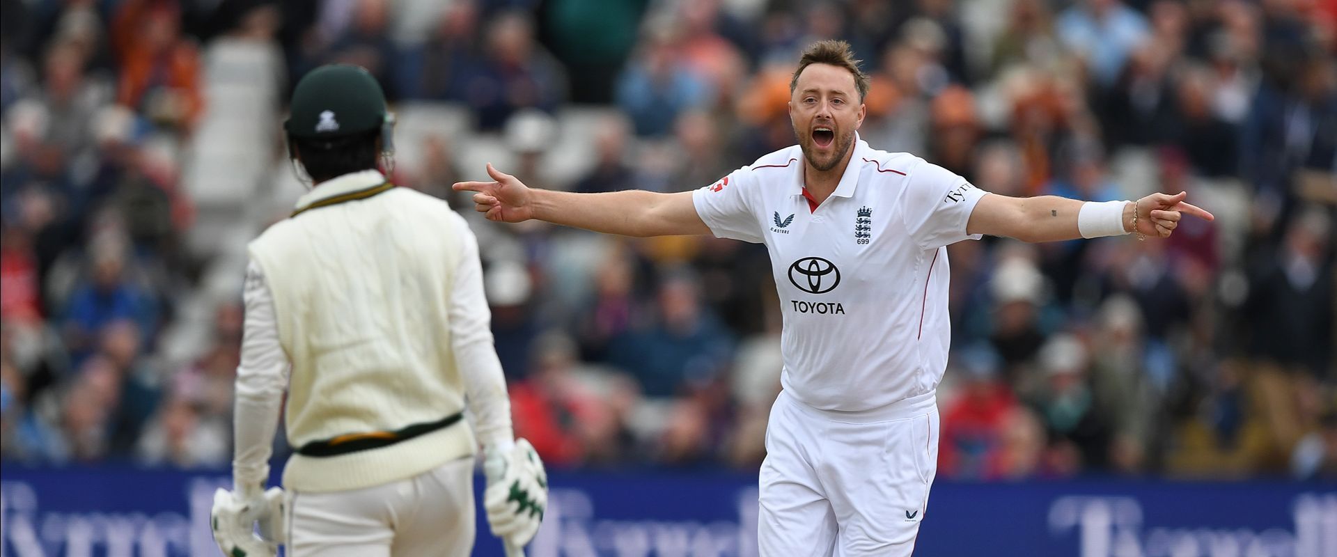 Ollie Robinson celebrates a wicket for England.