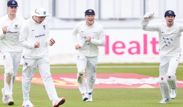 Sussex slips celebrate a wicket