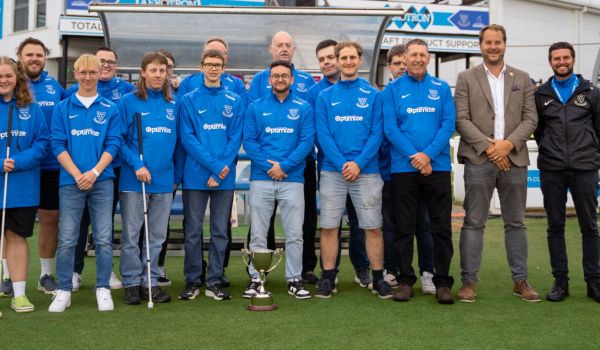 Sussex Sharks VI team line up with their trophy at the 1st central county ground