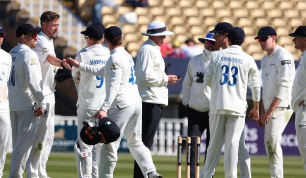 Sussex players gather to celebrate an Ollie Robinson wicket against Warwickshire.