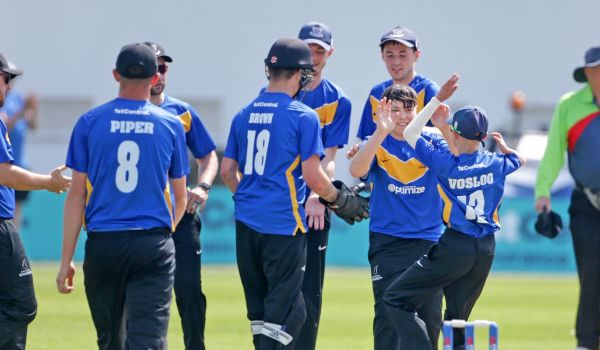 Sussex Cricket's D40 team celebrate a wicket.