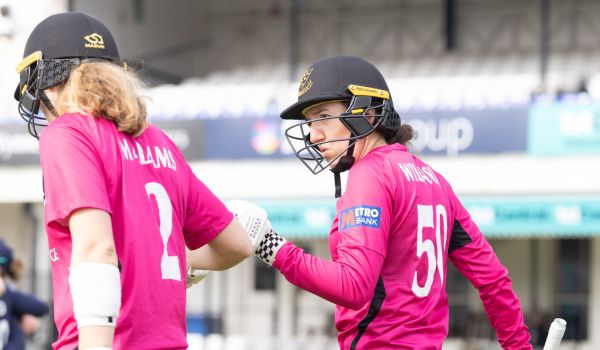 Mollie Adams and Phoebe Wilkinson step out to bat