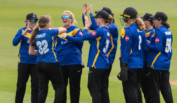 Susses Sharks Women celebrate after taking a wicket against Buckinghamshire in the previous round.