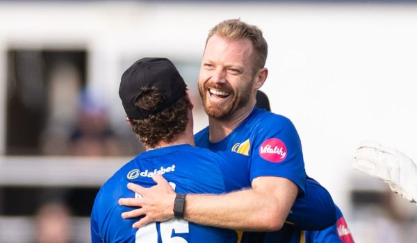Nathan McAndrew celebrates a wicket against Glamorgan.