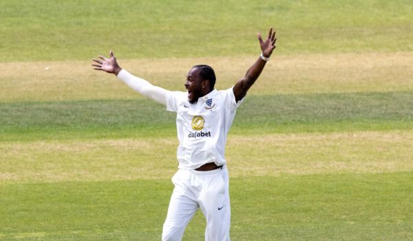 Jofra Archer appeals for a wicket while playing for Sussex.