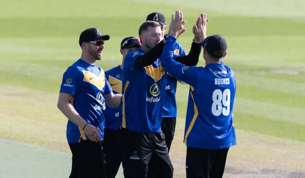 Sussex players celebrate after Ollie Robinson takes a wicket