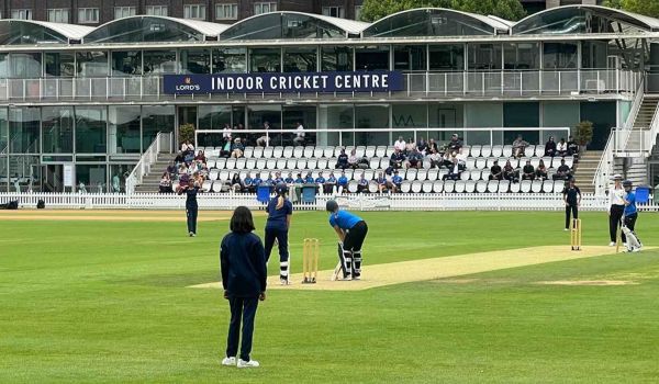 a wide shot of the u13 sussex girls playing at the nursery ground at lords