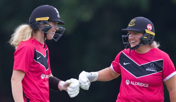 Mollie Adams bats with Izzy Collis