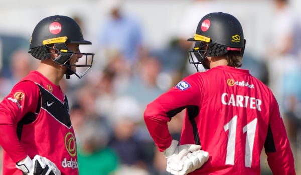 Lenham and Carter pictured in the middle together for Sussex.